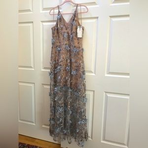 Dress the population pale blue flowers, nude colored long dress